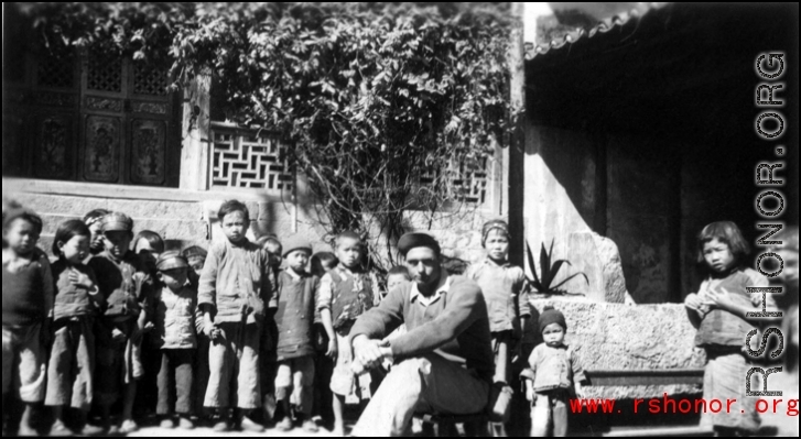 Chinese school room and pupils. "We couldn't get the teacher to pose." Frank Bates, Spring 1945  From the collection of Frank Bates.