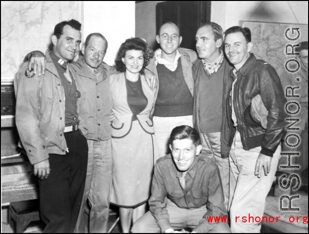Capt. James Stewart and Lt. Alex LeVay bracket five members of USO Tour Group at Yangkai, Oct 1944. Recognizable are Betty Colby and Pat O'Brien.  From the collection of Frank Bates. 