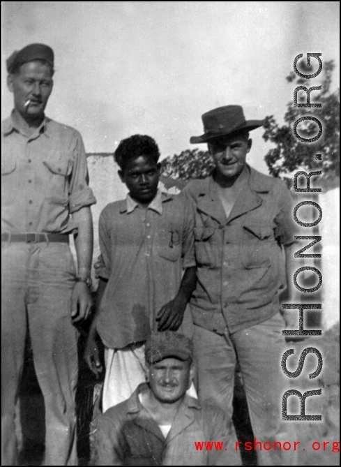 Big Chris, Bud Chapin, and another GI pose with local man in Chaukulia, India 1943.