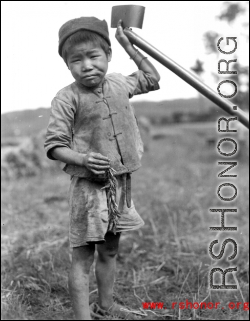 A close-up of the boy in the paddy at the foot of our area, Yangkai, China 1944.