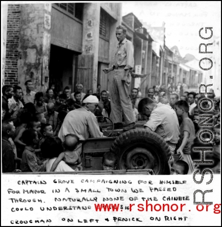 Capt. Grove campaigning for himself for mayor in a small town we passed through, from atop his jeep. Croughan on left, Capt. Penick on right.  Near an American base in Guangxi province (either Guilin or Liuzhou), China, during WWII.