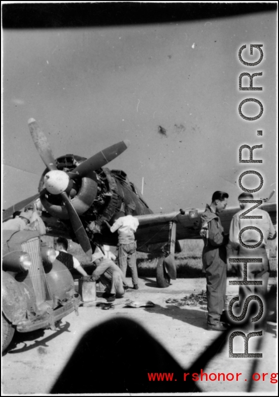 rew working out in the open on a non-American aircraft somewhere in southern China.  This is likely a Japanese Nakajima Ki-84 Hayate which the Chinese air force received after the war. 