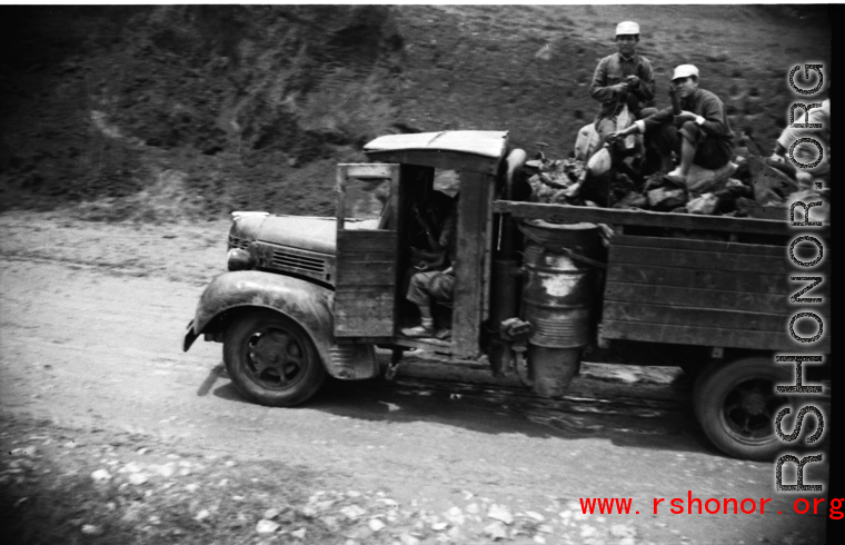 A charcoal (or even wood-fired) cargo truck. Luliang air base area.