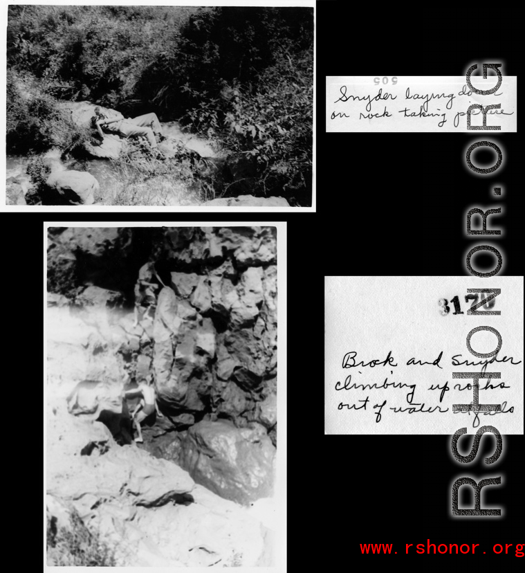 "Brock and Snyder climbing up rocks out of water at falls."  A dam and and falls about 8 miles southeast of the Luliang air base area in Yunnan province, China, where the GIs went to swim and relax. During WWII.