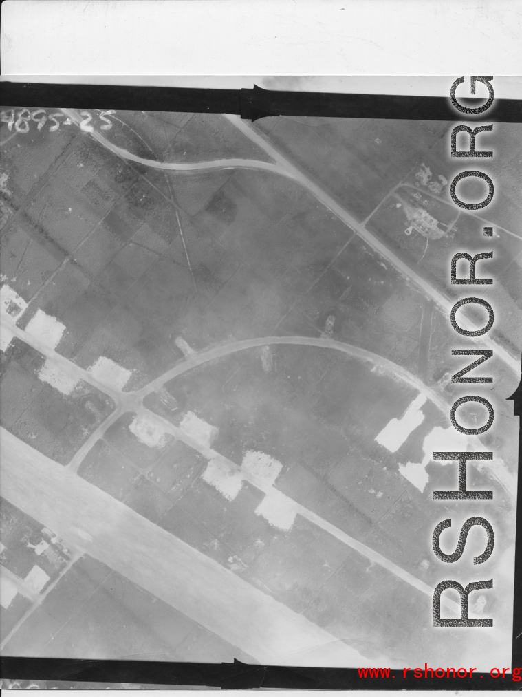 Aerial photograph of a base, possibly Allied, during WWII.