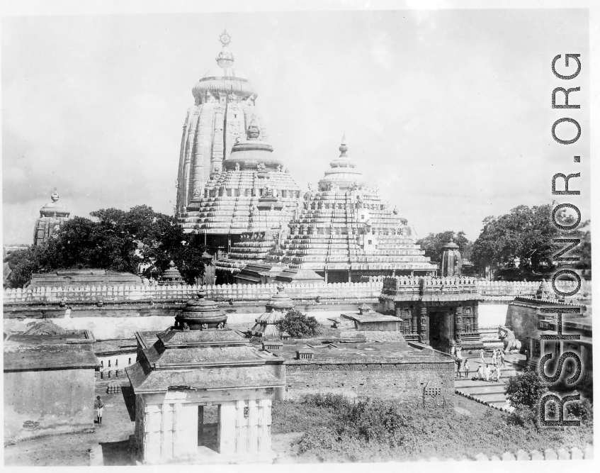 Enormous temple complex and architecture in India, at the large Jagannath Temple of Odisha complex (Hindu) in India.  Scenes in India witnessed by American GIs during WWII. For many Americans of that era, with their limited experience traveling, the everyday sights and sounds overseas were new, intriguing, and photo worthy.
