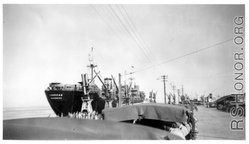 A convoy of American troops has finally arrived at the docks Karachi to see the troopship that would take them home, MS Torrens, in late 1945. This how Schuhart saw it before embarking for return to the US via the Suez and finally to New York harbor.