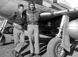 Col. Ed McComas and another man in front of Col. McComas' P-51D fighter (#44-11280) during WWII in the CBI.