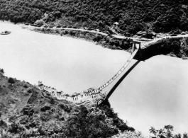 "Troops crossing Salween River by Hwi Tung [Huitong] footbridge, 8-2-44. US Army Photo 175-1." Burma. 2 August 1944.