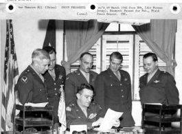 Tactical commanders of Maj. Gen. C. L. Chennault meet in observance of 14th Air Force Second Anniversary. Left to right: Brig. Gen. Russell E. Randall, Brig. Gen. Winslow C. Morse, Col. Clayton B. Claussen, and Brig. Gen Albert F. Hegenberger.