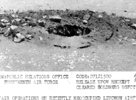 Mines placed on left and right of this hole on a runway by retreating Japanese at Liuzhou, Guangxi province, in the CBI, to induce the curious to approach and thereby detonate the mines.