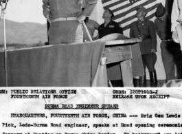 Brig. Gen. Lewis A. Pick gives a speech at the Burma Road opening ceremonies at Wanting. In the background (left to right) are General C. L. Chennault, General Wei Li Huang, and Lt. Gen. Dan I Sultan. Notably, both Chennault and Wei are looking skyward with interest at whatever planes are flying there.
