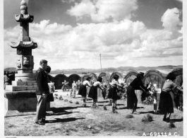 Men of the 14th Air Force and Chinese civilians honor war dead during Memorial Day service in China. 1944