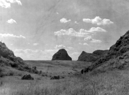 Grass hill between karst peaks in our around Liuzhou city, Guangxi province, China, in 1945.