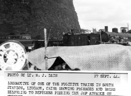 September 27, 1944.  During WWII, a locomotive of one of the fugitive trains in south station, Liuchow, China, showing packages and bales belonging to refugees fleeing the Japanese advance on Kweilin (Guilin).  Photo by Lt. N. J. Dain