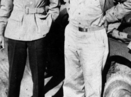 Chief Flight Surgeon, Col. Donald A. Flickinger, ATC (left), poses with W/O Fred "Pop" Henley, Sanitary Engineer, at a tea plantation near Tezpur, India, in December 1944.