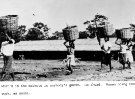 Women carrying baskets on their heads, likely in India. During WWII.  Photo from Robert M. Wilson.
