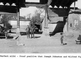 Joseph Johnston and Milfred Piper standing in a gate at Luliang, China, during WWII.  Photo from Marion Crawley.