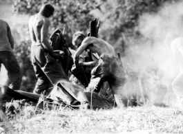 Mars Task Force mortar crew blasts Japanese near Lashio during WWII.  US Army Photo.