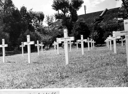 A temporary grave yard in the CBI. The cross of Lt. William Jonathan Davis, who died March 5, 1945, in the center.  Gillick.