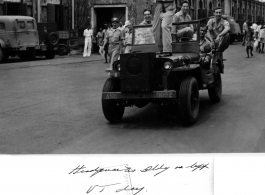 VJ Day silliness at Hasting Mills, India. HQ building on the left.  Photo from George Zdanoff.