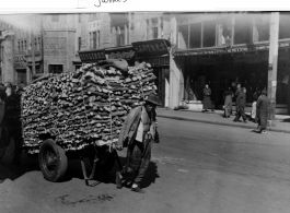 A hard-working wood peddler in Shanghai, right after WWII.  Photo from James T. Logue.