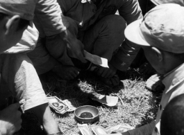 Chinese troops gambling. In the CBI during WWII.