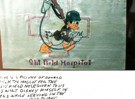 An embroidered picture of Donald Duck as mascot for the 21st Field Hospital, during WWII.  Photo from Savvy Savinelli.