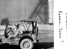 GI in front of dirigible hanger in Karachi, India, during WWII.  Image from Mark G. Mueller.  In the CBI during WWII. 