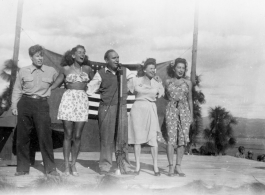 Pat O'Brien and his USO troupe perform at an American airbase in China in October 1944. Left to right they are Jimmy Dodd, Jinx Falkenberg, Pat O'Brien, Ruth Carrol and Betty Yeaton.  From the collection of Elmer Bukey.