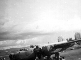 A B-24 under maintenance by 396th Air Service Squadron during WWII, in China. 