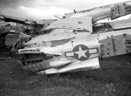Wrecked American aircraft in the boneyard at the American airbase (including a P-38)--many of these were used as salvage for spare and repair parts for planes that were still flying.