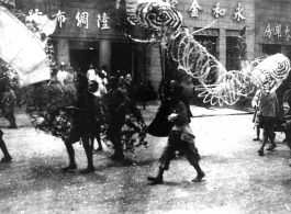 A local parade in China in the CBI during WWII.