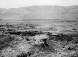 Overview of the American airbase at Yangkai (Yangjie) during WWII. Frank Bates notes, "Looking west across the valley. The newest planes' tail numbers are 336 & 340 and piloted by Alexander & Brillhart. Yangkai Army Air Base, China, early 1944." The 22nd and 491st Bombardment Squadrons arrived in January 1944 and shared the base with the 373rd Bomb Squadron (B-24s) for a few months. In the fall of 1944, the Japanese army overran the Liuzhou and Guilin bases, the 11th Bomb Squadron joined its "sister" units 