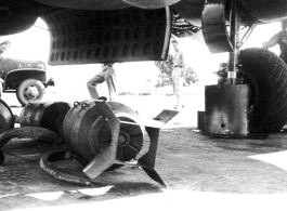 Large bombs being loaded onto a B-25 Mitchell bomber in China during WWII.  From the collection of Frank Bates.