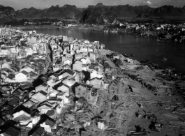 Aerial view of Liuzhou, Guangxi, China, during WWII, showing the break-neck post-occupation recovery and rebuilding after the Japanese retreat. 1945.