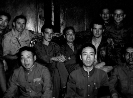Both Chinese and American soldiers pose with KMT civilian official at rally. This should be An Zefa (安则法), a highly educated official who had a number of roles in Yunnan during WWII.
