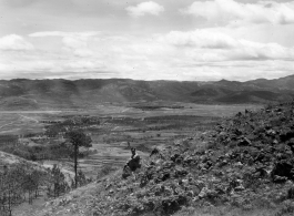 An American serviceman walking  on the hill above Yangkai air base, in Yunnan province, China, during WWII.