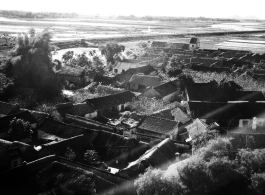 A village as seen from a B-25 flying at extremely low and dangerous treetop level in French Indochina. During WWII.