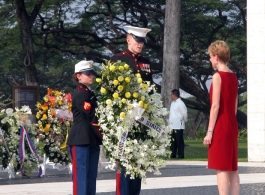 U.S. Ambassador Keeney inspects a wreath on Memorial Day 2006.  Photo by Dave Dwiggins.