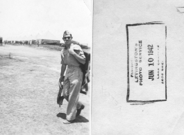 1st Lt. Irving Woodrow DeGon passes in front on tent carrying flying gear while in training.  Finished on June 1, 1942, by Levingston's Photo Service, Lake Charles, Louisiana. This is during his period of advanced training at Barksdale Field, Louisiana.