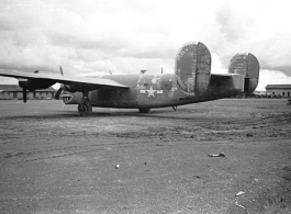 A very tired and very worn B-24 at an American air base in Yunnan province, China, during WWII. Notice that the tail has been capped and has no guns.
