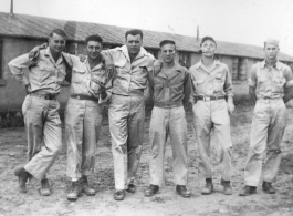 American flyers pose in Yunnan, China, during WWII. Likely 308th Bombardment Group.