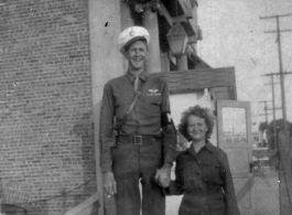 Tallest service man, John Gerber, meets shortest service woman. During WWII. At this point John Gerber is stateside, during his six month stint as an MP.