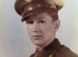 John Gerber in uniform and with Army Air Forces WWII Shoulder Patch, in hand-colored image.