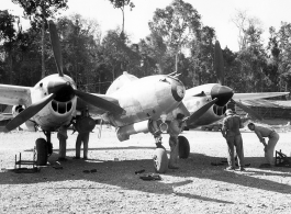 Aircraft in Burma near the 797th Engineer Forestry Company, a P-38 undergoing maintenance.  During WWII.