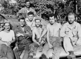 "Part of boys, a very nice picture."  Leo Spearence (with pipe) in center, John Schuhart (far right).  Likely in Burma. 2005th Ordnance Maintenance Company,  28th Air Depot Group.