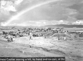 Workers removing hill by hand labor at Chenggong (Dog Baker) air base during WWII.