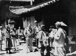 Flyers visit village near and American base is SW China. 22nd Bombardment Squadron, during WWII.