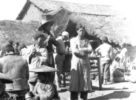 Open-air market in village near and American base is SW China. 22nd Bombardment Squadron, during WWII.